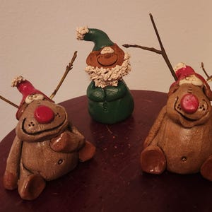 Nancy & Bill Hicks, North Carolina Regional pottery, Reindeer, elf, whimsical redware figures, signed