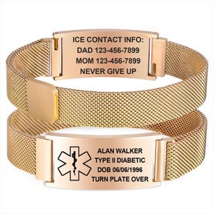 May include: Gold-toned medical ID bracelet with a mesh band. The top plate reads "ICE CONTACT INFO: DAD 123-456-7899 MOM 123-456-7899 NEVER GIVE UP." The bottom plate has a medical symbol and reads "ALAN WALKER TYPE II DIABETIC DOB 06/06/1996 TURN PLATE OVER."