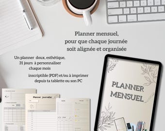 May include: A digital planner with the text "Planner Mensuel" on a tablet, surrounded by stationery and a cup of coffee. The planner is designed for monthly organization and includes printable PDF options.