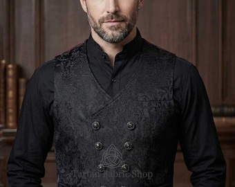 May include: Black double-breasted vest with ornate floral pattern and decorative buttons. The vest is worn over a black collared shirt. The image includes the text "Tartan Fabric Shop".