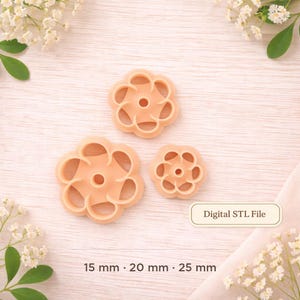May include: Three peach-colored flower-shaped cookie cutters in varying sizes. The cutters are 15 mm, 20 mm, and 25 mm in diameter. The image includes the text "Digital STL File".