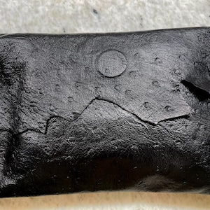 Bolso de mano de noche de piel texturizada negra