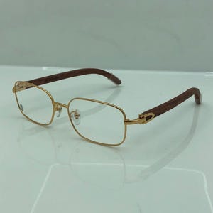 Cartier Brille aus Holz Vintage Golden Oval Braun Holz Brillen