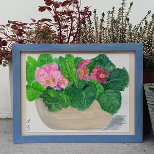 Jardinière de primevères : aquarelle de fleurs encadrée