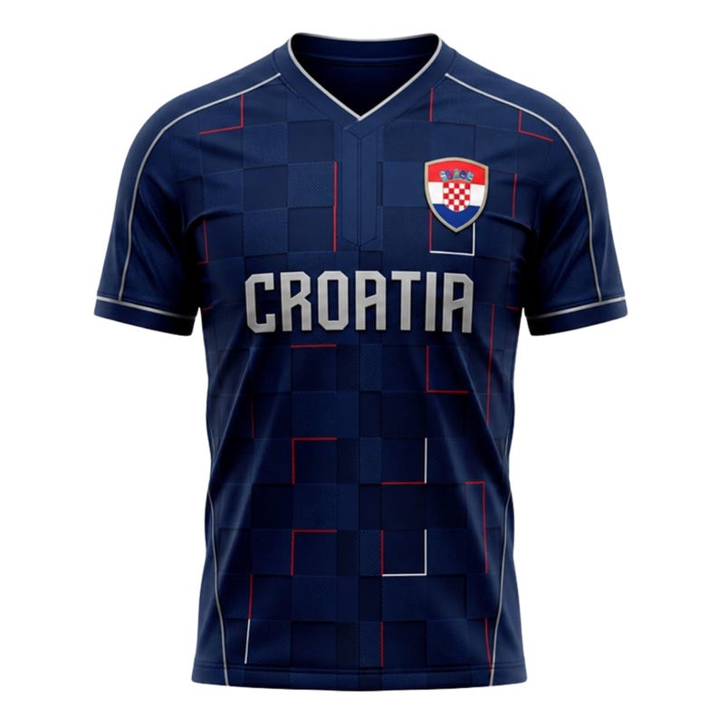 May include: Navy blue Croatia soccer jersey with a textured pattern. The jersey features the word "CROATIA" in silver letters across the chest, along with the Croatian coat of arms. Red and white accents are visible.