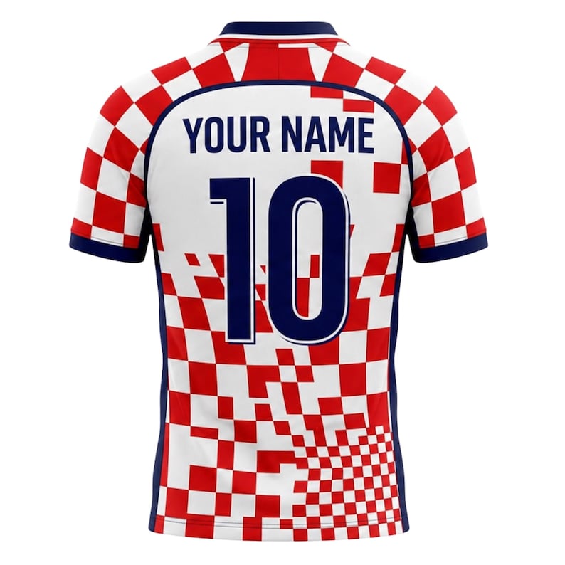 May include: A white and red checkered soccer jersey with the number 10 in navy blue. The jersey has a navy blue collar and sleeves. The text "YOUR NAME" is above the number.
