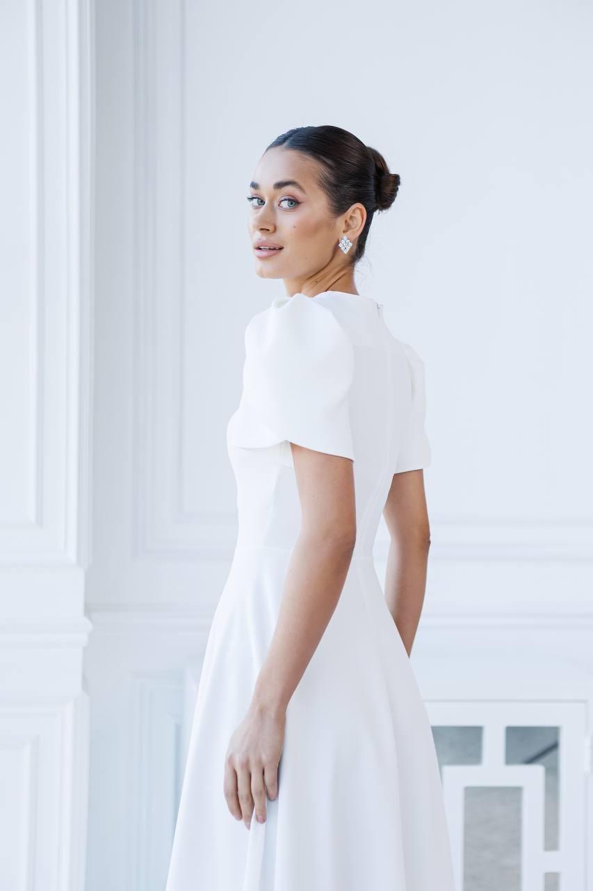 white short sleeve wedding dress by Adrianna Papell 40383 the dress features delicate lace short sleeves that add a touch of femininity Little White DressAzazie