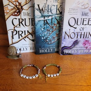 The cruel prince Cardan and Jude 2pc bracelet set with gold chain and sword/leaf charm