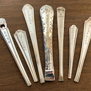 May include: Seven silver-plated spoons with engraved names of herbs: Sage, Oregano, Thyme, Marjoram, Parsley, Basil, and Rosemary.