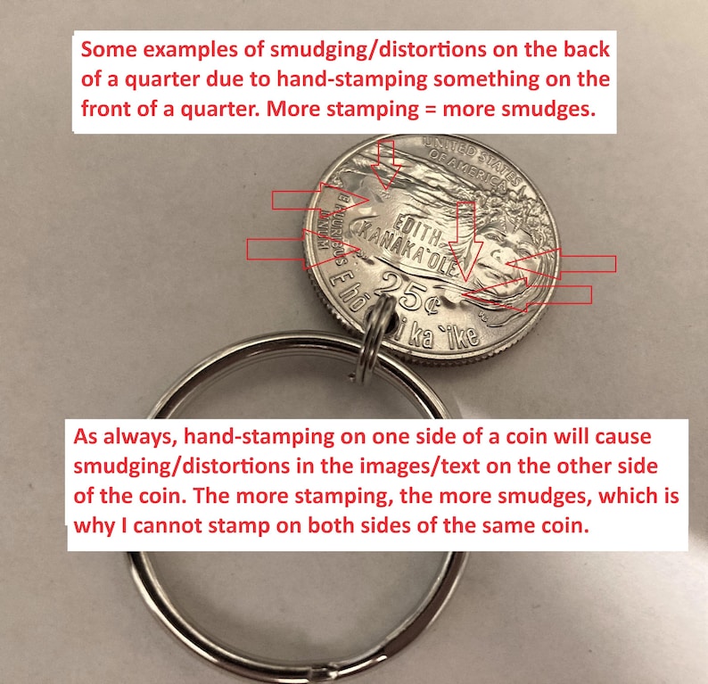 May include: A quarter coin with the text "EDITH KANAKA OLE" and "25&cent; ka ike" is attached to a silver keyring. The image shows examples of smudging and distortions on the coin's back due to hand-stamping on the front.