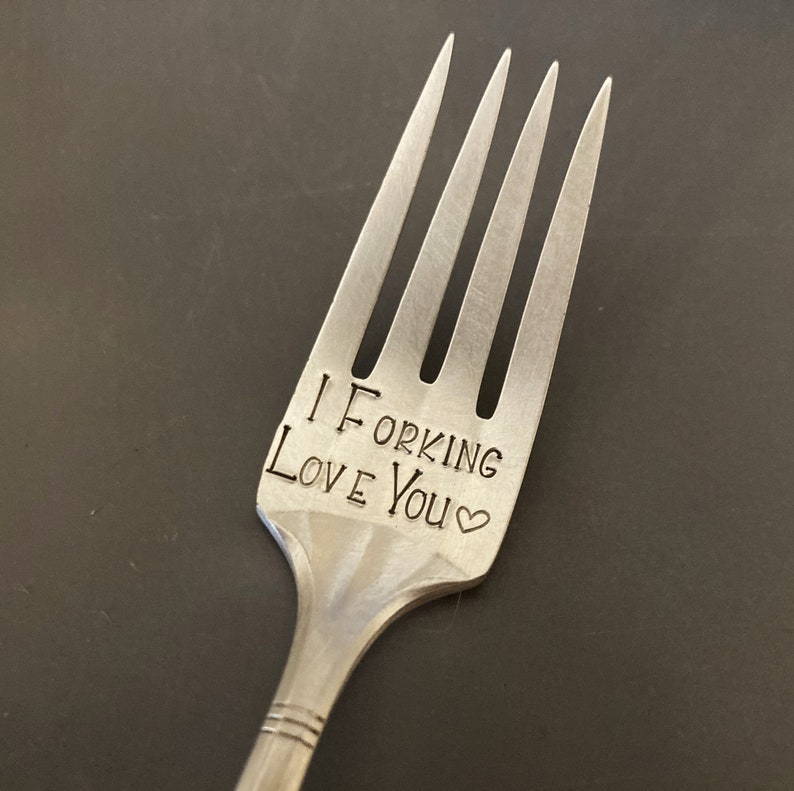 May include: A silver fork with the words "If Forking Love You" engraved on the handle. A small heart symbol is included after the word "You".