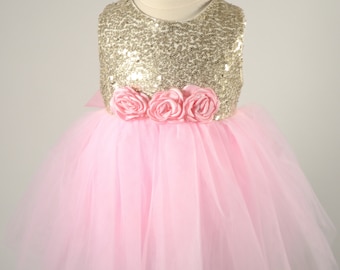 pink and gold dress baby