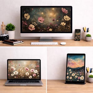 May include: A desktop computer, laptop, tablet, and smartphone display floral artwork. The computer screen shows pink and cream-colored flowers against a dark background. The laptop and smartphone also display floral art. The tablet shows a sunset scene.