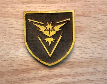 Pokemon GO Team Instinct wood pin