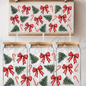 May include: Three clear glass jars with wooden lids and red bows, candy canes, and Christmas trees printed on them.