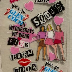 May include: A clear sticker sheet with various pink and black text and illustrations. The text includes phrases like "Burn Book," "Get in Loser, We're Going Shopping," and "On Wednesdays We Wear Pink." There are also illustrations of women.