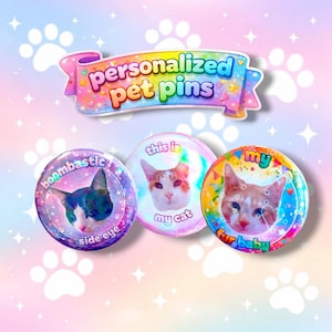 May include: Three colorful, round pet pins featuring cat portraits and phrases like "boombastic side eye," "this is my cat," and "my fur baby." A banner above reads "personalized pet pins."