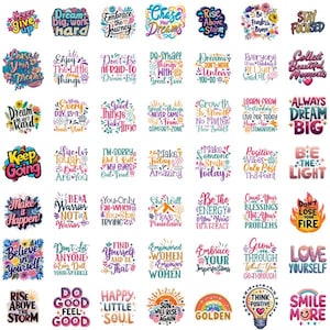 May include: A collection of colorful, inspirational quote stickers with floral and rainbow accents. The quotes include phrases like "Dream Big," "Believe in Yourself," and "Love Yourself." The stickers are designed for various uses.