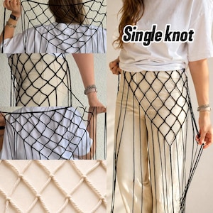 May include: A black macrame net skirt overlay featuring a single knot pattern. The garment is worn over a white t-shirt and light-colored pants. The net consists of a diamond-shaped grid of black cord, with long vertical fringe strands extending downward.