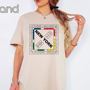 New York Monopoly T-Shirt, Cute New York Shirt, Carrie New York Monopoly Shirt, Trendy Graphic Shirt, Monopoly Lovers Shirt, Monopoly Shirt