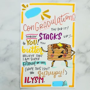 Tarjeta de graduación por correo postal escrita a mano con su mensaje personalizado Felicitaciones