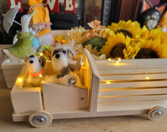 Handmade wooden car and felted mini schnauzer