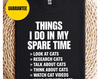 Dingen die ik in mijn vrije tijd doe grappig katten-T-shirt - Uniseks softstyle T-shirt, grappig schattig katten-T-shirt, kattenliefhebber cadeau, shirt kat moeder, shirt kat vader, T-shirt kat