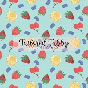 May include: A repeating pattern of illustrated fruits including lemons, strawberries, raspberries, cherries, and blueberries on a light blue grid background. The text "Tailored Tabby 300 DPI | 12" x 12"" is overlaid on the image.