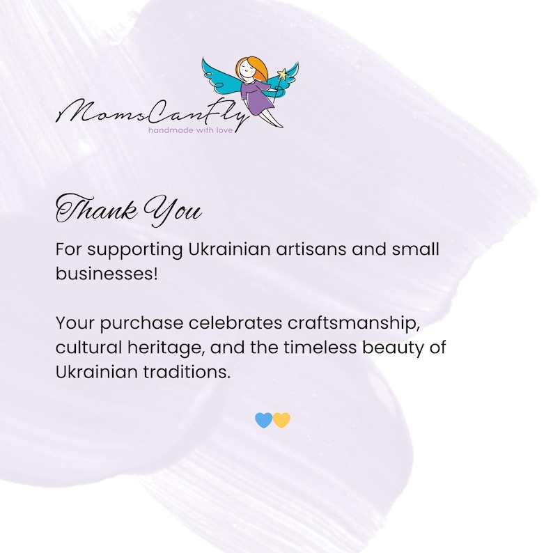 May include: A white card with a light purple brushstroke background featuring the MomsCanfly logo with a fairy illustration. The text reads: Thank You For supporting Ukrainian artisans and small businesses! Your purchase celebrates craftsmanship, cultural heritage, and the timeless beauty of Ukrainian traditions. A blue and yellow heart icon is at the bottom.