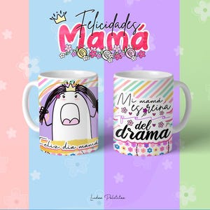 May include: Two white ceramic mugs with colourful designs. One mug features a cartoon character with a crown and the text "Feliz dia mama". The other mug has a rainbow stripe design and the text "Mi mama es reina del drama".