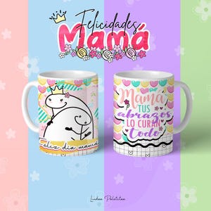 May include: Two white ceramic mugs with colourful designs. One mug features a cartoon illustration of two hugging figures with the text "Feliz dia mama". The other mug features the text "Mama tus abrazos lo curan todo".