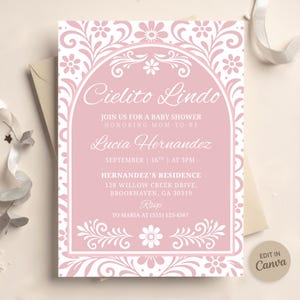 May include: Pink baby shower invitation with the words "Cielito Lindo" in elegant script. The invitation includes details for Lucia Hernandez's baby shower, with a floral border and the text "Edit in Canva."
