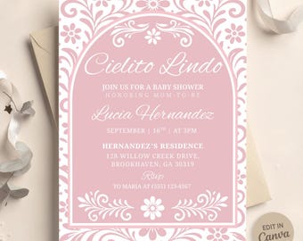 May include: Pink baby shower invitation with the words "Cielito Lindo" in elegant script. The invitation includes details for Lucia Hernandez's baby shower, with a floral border and the text "Edit in Canva."