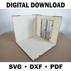 May include: A light-colored, laser-cut wooden room diorama with a window. The words "DIGITAL DOWNLOAD" are at the top, and "SVG • DXF • PDF" are at the bottom. The diorama is designed to stand upright.