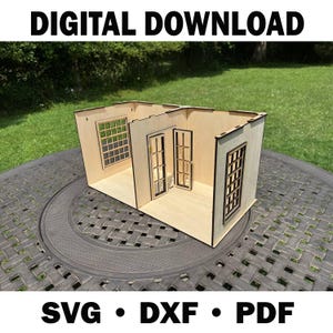 May include: A laser-cut wooden dollhouse with window and door cutouts. The text "DIGITAL DOWNLOAD" is at the top, and "SVG • DXF • PDF" is at the bottom. The dollhouse is on a dark gray table.