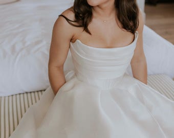 Strapless Ball Gown Wedding Dress, Structured A Line Bridal Gown With Pleated Bodice And Full Skirt, Modern Princess Minimalist Bridalwear