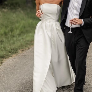 Strapless Wedding Dress With Pleated Skirt, Minimalist Satin Bridal Gown, Clean A-Line Silhouette, Timeless Classic Style