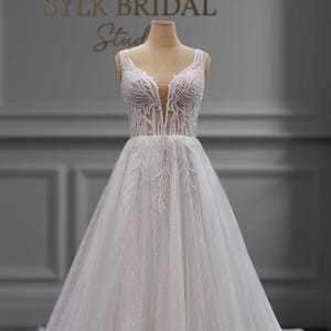 A-Line Wedding Dress With Plunge Illusion Bodice, Sparkle Tulle Skirt, Corset Back, Glam Sleeveless Bridal Gown, Beaded Appliqué Embellished