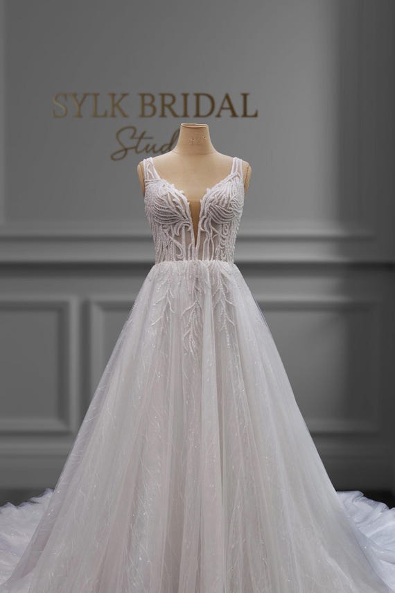 A-line Wedding Dress With Plunge Illusion Bodice, Sparkle Tulle Skirt, Corset Back, Glam Sleeveless Bridal Gown, Beaded Appliqu Embellished - Etsy New Zealand A-line Wedding Dress With Plunge Illusion Bodice, Sparkle Tulle Skirt, Corset Back, Glam Sleeveless Bridal Gown, Beaded Appliqu Embellished - Etsy New Zealand