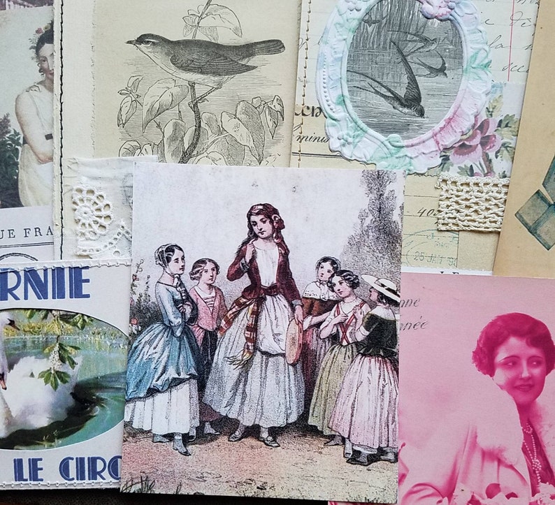 May include: A vintage illustration of a group of girls in dresses standing in a forest. The girls are wearing various colors, including blue, red, and pink. The illustration is printed on a piece of paper with a white background.