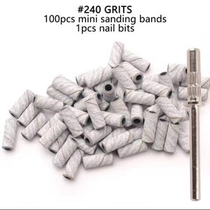 May include: A set of 100 grey mini sanding bands and one nail bit for use with a rotary tool. The sanding bands are #240 grit.