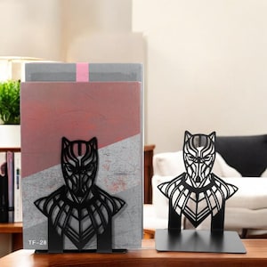 black panther gift
superhero bookends
hero book stand
comic book holder
geek home decor
metal bookends
Avengers gift
bookshelf organizer
nerdy home decor
movie fan gift
book stand for men
Wakanda gift
superhero decor