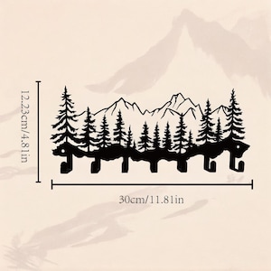 May include: Black metal wall hook with a silhouette of a mountain range and pine trees. The hook measures 12.23 inches tall and 30 inches wide.