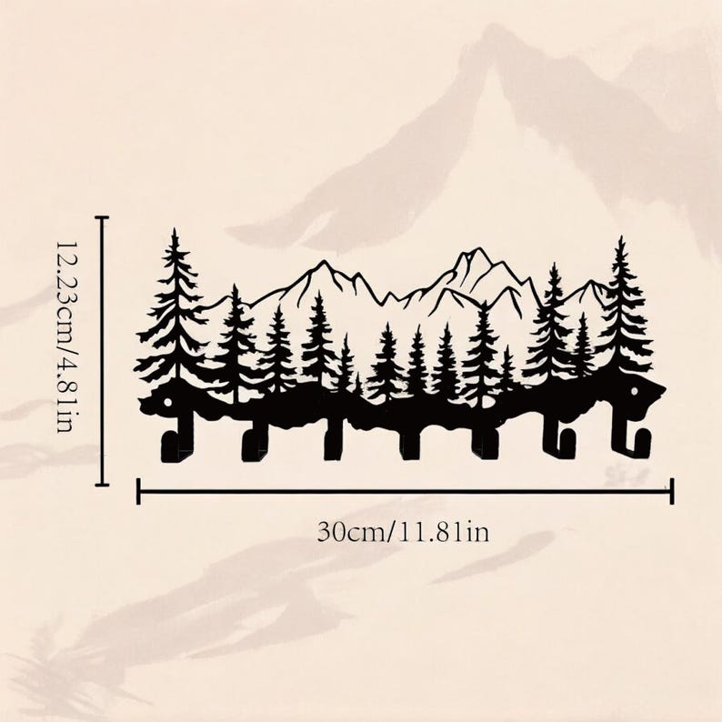 May include: Black metal wall hook with a silhouette of a mountain range and pine trees. The hook measures 12.23 inches tall and 30 inches wide.