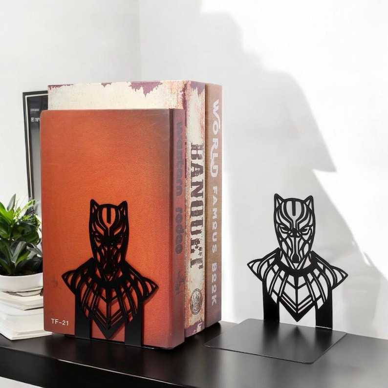 black panther gift
superhero bookends
hero book stand
comic book holder
geek home decor
metal bookends
Avengers gift
bookshelf organizer
nerdy home decor
movie fan gift
book stand for men
Wakanda gift
superhero decor