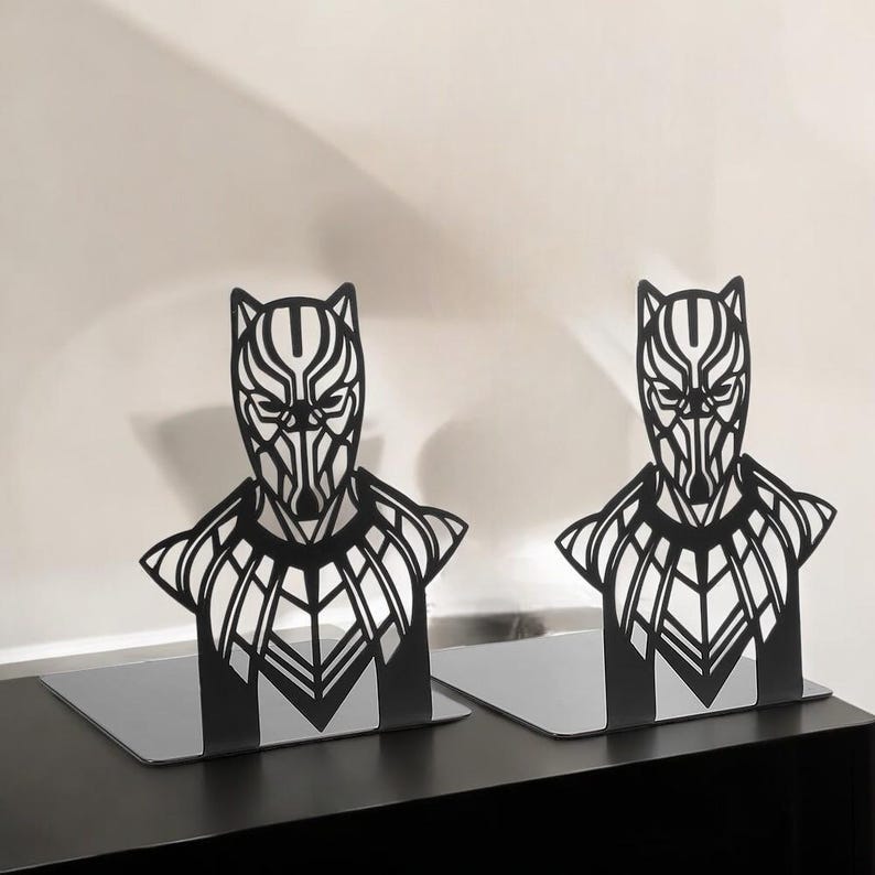 black panther gift
superhero bookends
hero book stand
comic book holder
geek home decor
metal bookends
Avengers gift
bookshelf organizer
nerdy home decor
movie fan gift
book stand for men
Wakanda gift
superhero decor