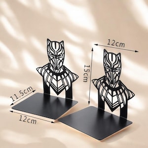 black panther gift
superhero bookends
hero book stand
comic book holder
geek home decor
metal bookends
Avengers gift
bookshelf organizer
nerdy home decor
movie fan gift
book stand for men
Wakanda gift
superhero decor