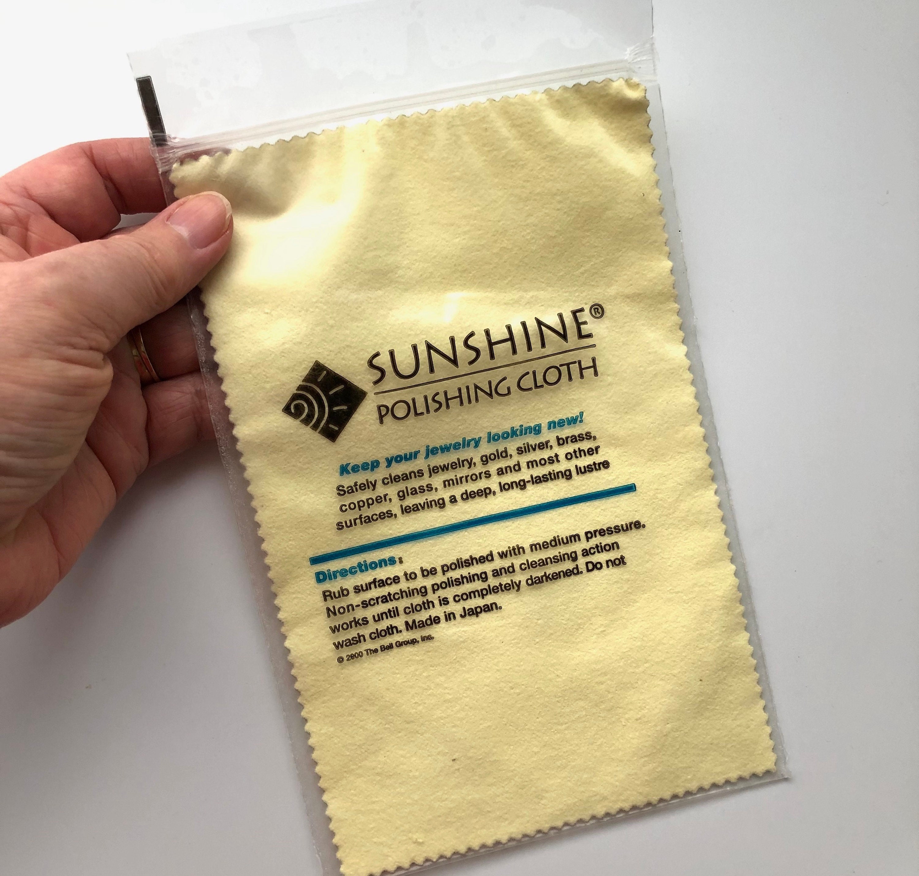 Polishing cloth, Sunshine®, light yellow, 7-3/4 x 5-inch rectangle. Sold  individually. - Fire Mountain Gems and Beads