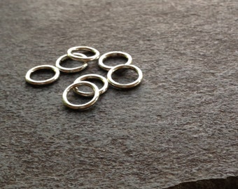 Seven stitch markers, stainless steel, rings for knitting (medium)