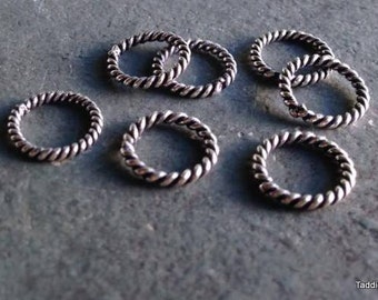 Seven stitch markers, sterling silver over solid twisted copper, rings for knitting (medium)